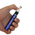 MERRISUN serum held in hand showing rollerball applicator